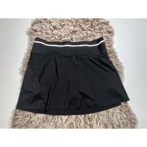 Athleta women’s black athletic skirt with built shorts